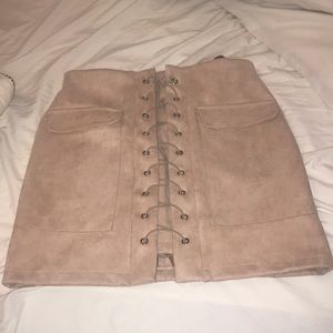 lace up nude/blush mini skirt. never worn before